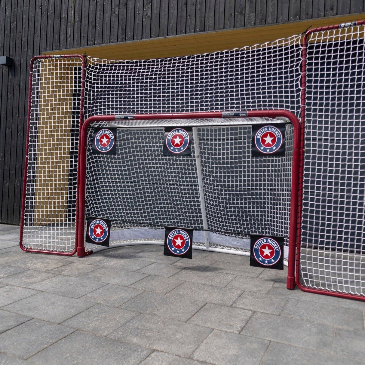Hockeymål med skottavlor i ett set, designade för att förbättra träffsäkerhet i hockeyskott. Passar officiella målburar.